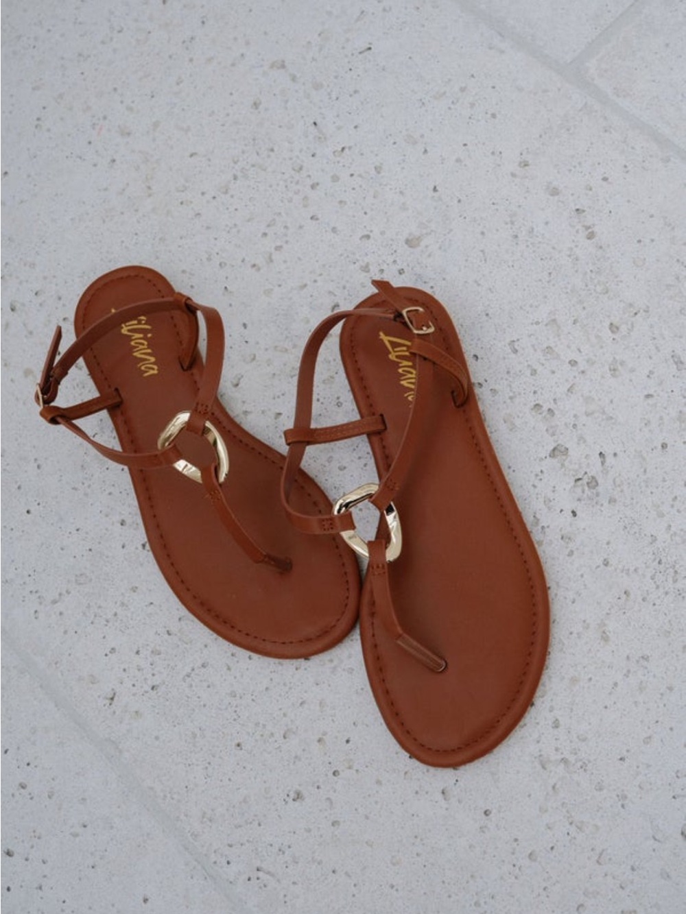 Tiana Brown T-Strap Sandals with Gold Ring Accent
